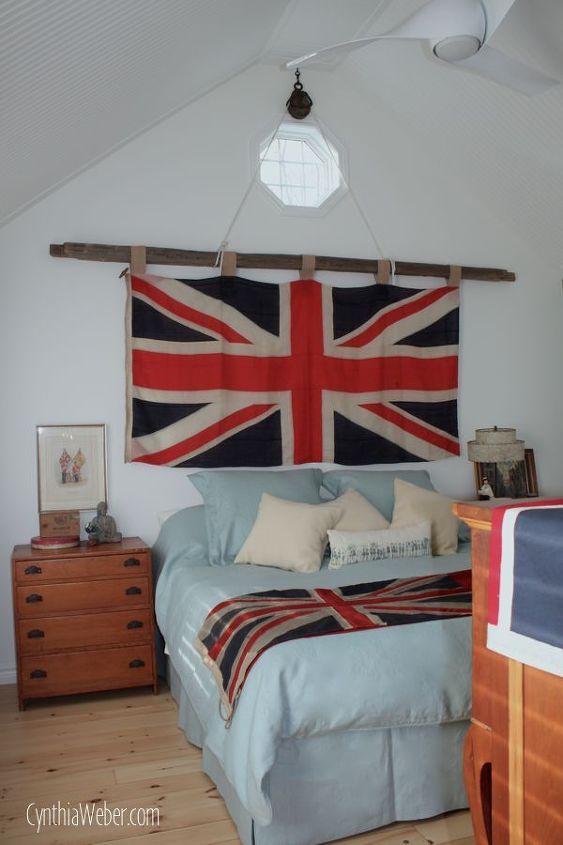 creating a rustic chic bedroom with a vintage union jack flag, bedroom ideas, home decor, I used an antique Pulley rope and a cedar rail to hang this beautiful Union Jack Flag
