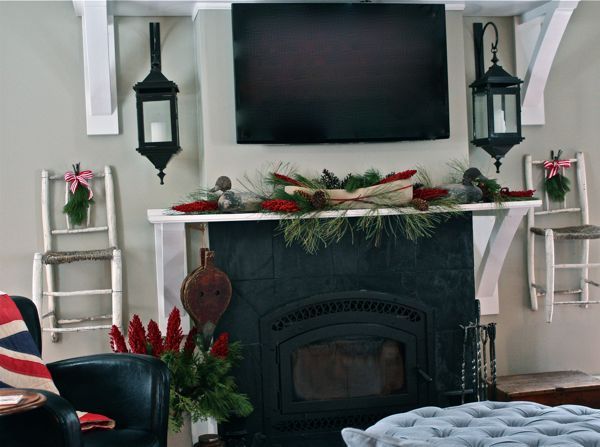 a rustic mantel and a cozy fire the family room at hoop top house decked out for, seasonal holiday d cor