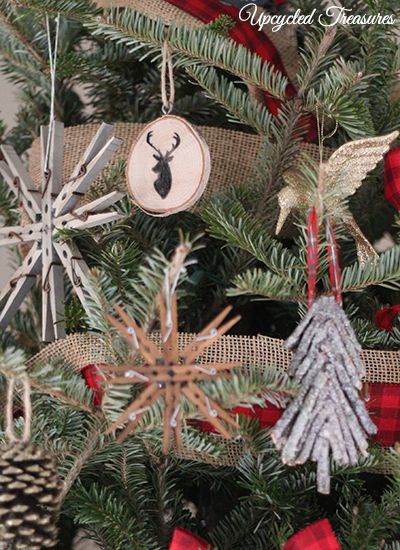 our cabin inspired christmas tree, seasonal holiday d cor, I also made some clothespin snowflakes from leftover clothespins we used to hold vintage postcards as our wedding guestbook