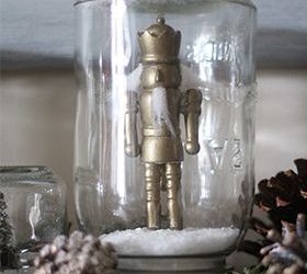 it s not too late for mason jar snow globes, crafts, mason jars, repurposing upcycling, seasonal holiday decor, Nutcracker ornament painted gold and placed in a mason jar snowglobe