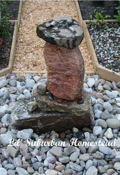 build your own raised colonial gardens, diy, gardening, how to, raised garden beds, woodworking projects, A close up on our centerpiece of the garden This also serves as the drinking fountain for our bees