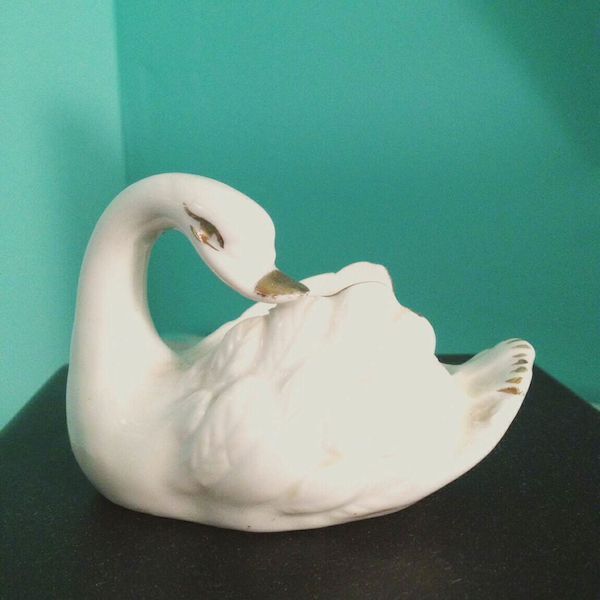 thrift score thursday share your thrifty finds, home decor, repurposing upcycling, My thrift score this week is this adorable swan ceramic Find out how much she cost on my blog