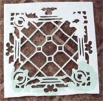 tin ceiling tile look for almost free with plaster and paint, I traced the pattern on that shelf liner and with a razor blade cut out the places I wanted to STICK OUT