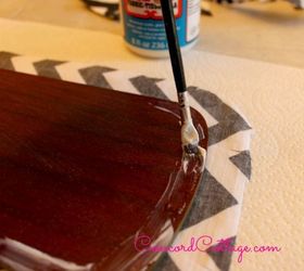 ceiling fan makeover with black white chevron, repurposing upcycling, reupholster, I use a paint brush to apply it to my area