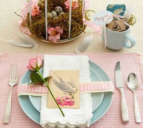easter decorating round up, easter decorations, fireplaces mantels, patriotic decor ideas, seasonal holiday d cor, wreaths, And how sweet is this tablescape using vintage notecards birdcages moss and eggs Love it It is also from Better Homes Gardens