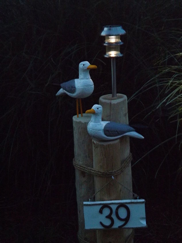 nautical lawn piling with seagulls solar light and address plaque