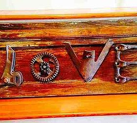 Rustic LOVE sign from old farm implement parts