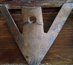rustic love sign from old farm implement parts, crafts, repurposing upcycling, Part of a plow