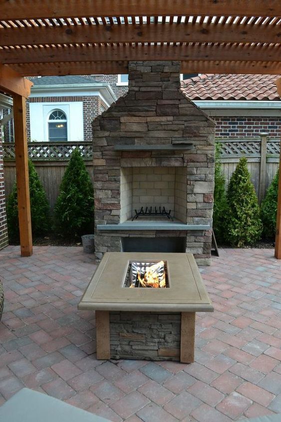 a backyard upgrade with a unique vegetable garden fence, Outdoor Fireplace