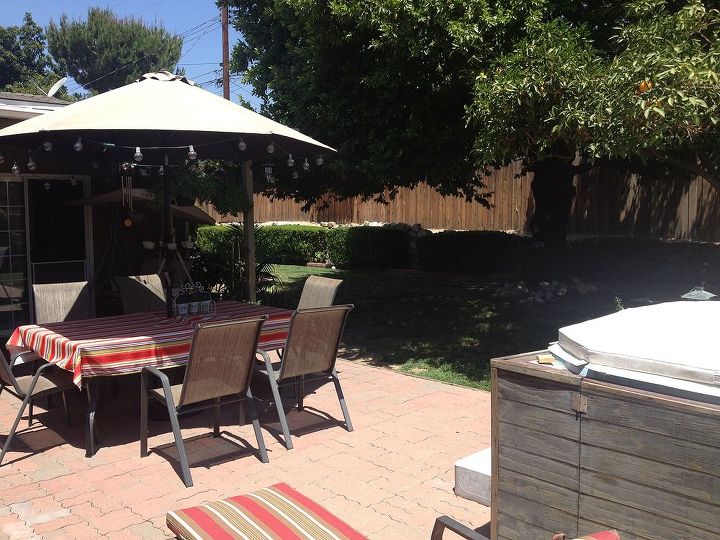 back yard wasted space needs ideas, decks, outdoor furniture, outdoor living, Space is above stone wall