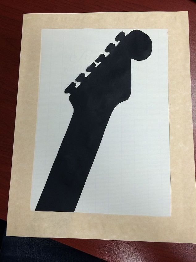 silhueta de papel de guitarra