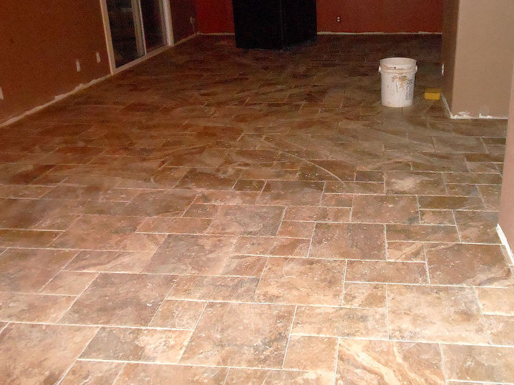 home renovation redo floors painting, flooring, home improvement, kitchen design, tile flooring, tiling, Installing the Tile