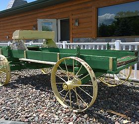 garden ideas wagon color change, gardening, outdoor living, This replica of a farmer s wagon needs TLC