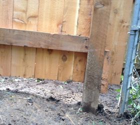 how to correct poorly installed wood fence, Opposite corner shows rail to high gap connection to neighbors chain link