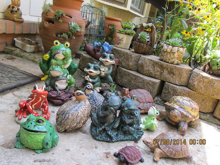 garden ideas totems art painting planters, concrete countertops, flowers, gardening, repurposing upcycling, succulents, After I painted all those dull figurines