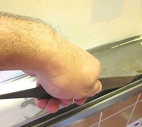 medicine cabinets repair toothbrush water damage prevent its return, Pic 4 Metal filing a raised bump of rust