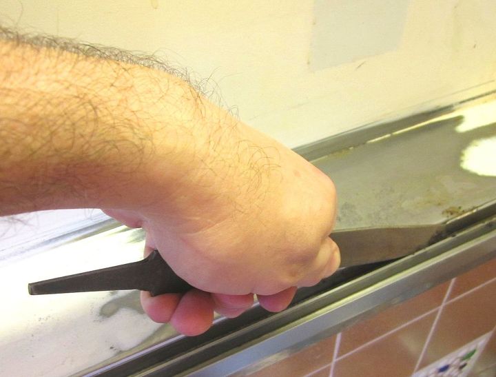 medicine cabinets repair toothbrush water damage prevent its return, Pic 4 Metal filing a raised bump of rust