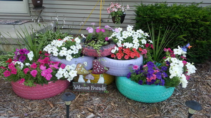 garden ideas tire planter colorful upcycle, container gardening, flowers, gardening, repurposing upcycling