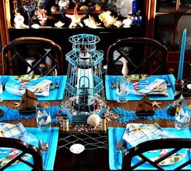 nautical tablescape with lighthouses, home decor, Sailboats and lighthouse candle holders