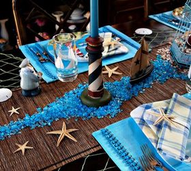 nautical tablescape with lighthouses, home decor, Tumbled glass represents the sea
