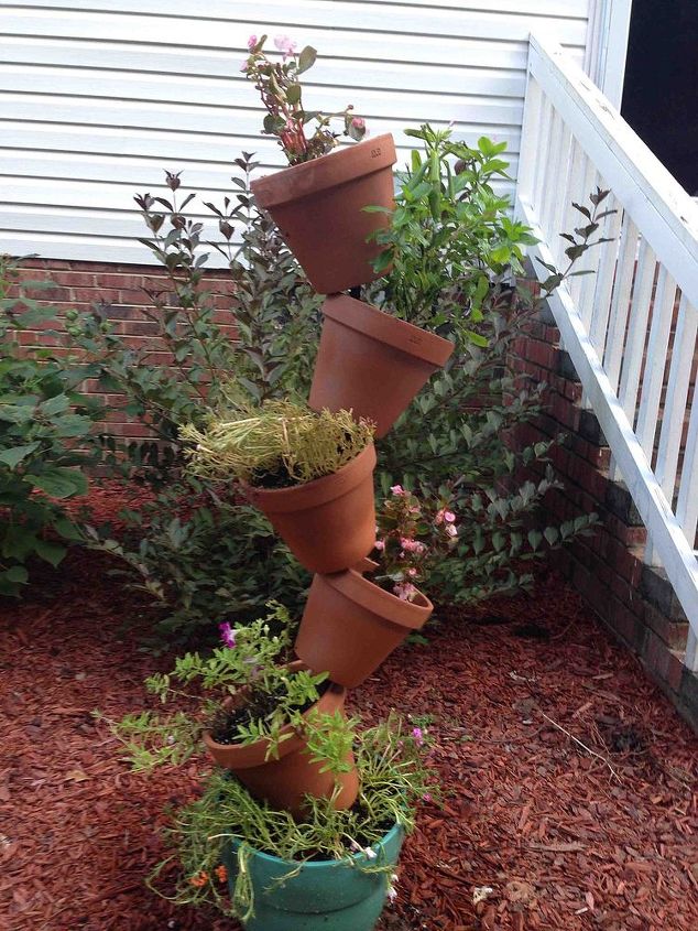 planter project, container gardening, diy, flowers, gardening, repurposing upcycling, I use 6 pots on this on with a 6ft price of rebar
