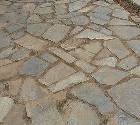 cement alternative for flagstone patio joints, Flagstone on slight a lope towards patio with sand joints