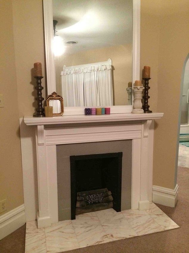 updated my fireplace tile with paint, diy, fireplaces mantels, painting, After glossy can t tell in the photo grey paint to update it