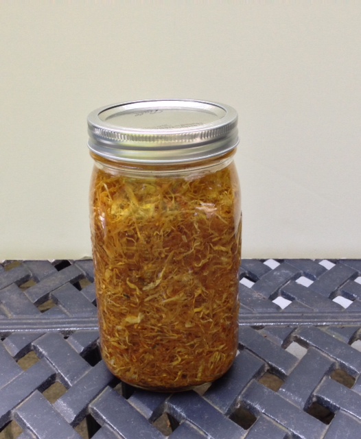 making herbal oils and vinegars, homesteading, Calendula oil Great for your skin