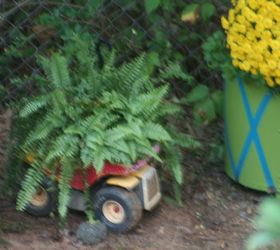 garden art door upcycle repurpose, container gardening, gardening, landscape, outdoor living, repurposing upcycling, woodworking projects, Tonka truck and fern