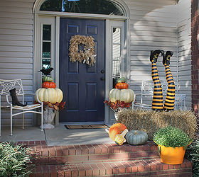 halloween decorations witch legs hay bale, halloween decorations, porches, seasonal holiday decor