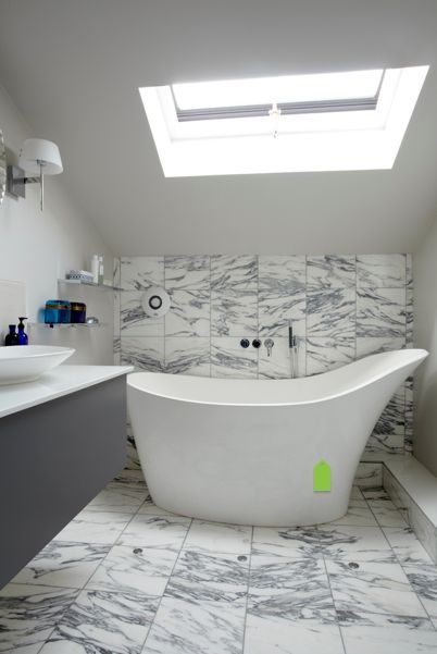 small bathroom solutions, bathroom ideas, small bathroom ideas, Just because your bathroom is small doesn t mean you have to skip the drama This tub is small scale but has a big presence This with the addition of the skylight make this bathroom feel grand not small