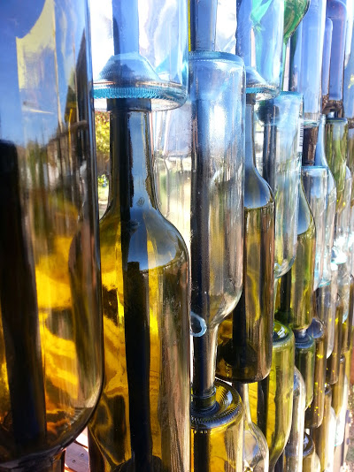 Diy Bottle Wall Idea Hometalk Bottle Wall Build Upcycle How To Patio Repurposing Upcycling Decor