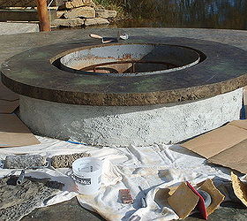 concrete fire pit with vertical carved stonework, concrete masonry, outdoor living