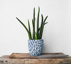 A Flower Pot With Sweater