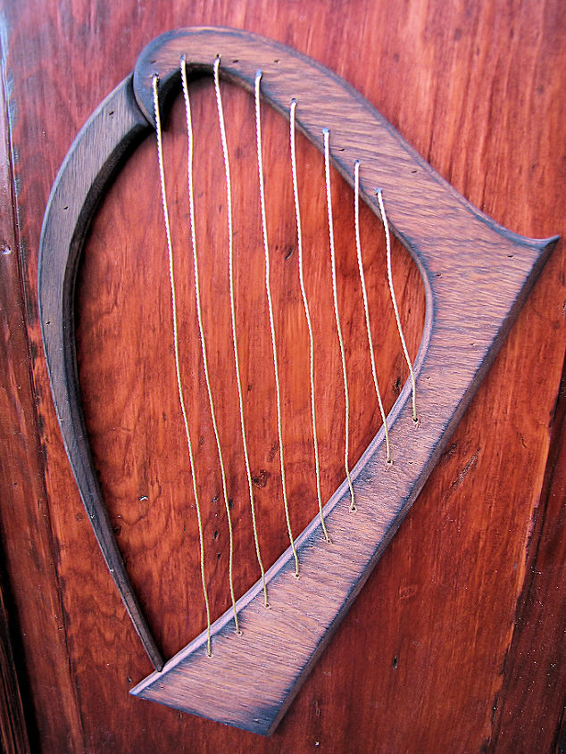 upcycled door beams turned irish pub style bar, Harps made from mahogany strung w brass wire