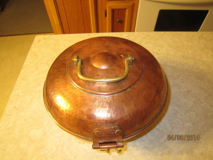 does anyone know what this pot is used for, top of the closed pot with handle