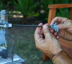 upcycled backyard bottle torches, lighting, outdoor living, repurposing upcycling