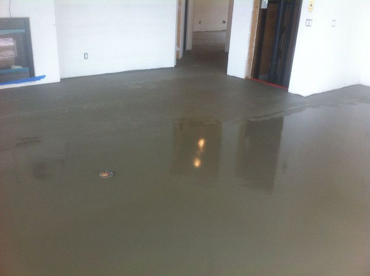 flooring pool room transformation, More self leveling compound gets installed