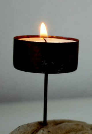 q where do i find spiked tealight holders in bulk, crafts, home decor, It appears to be metal or steel with a 4 to 6 spike