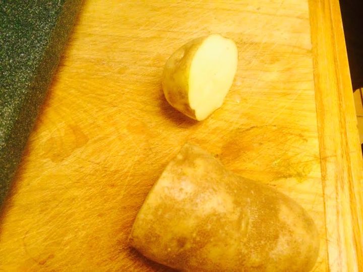 Large white potato in half