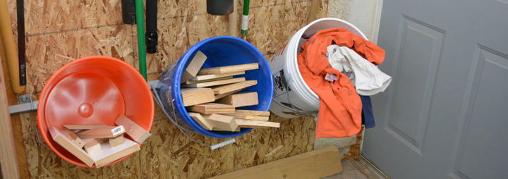 installing a bucket storage rack for garage, garages, storage ideas, woodworking projects