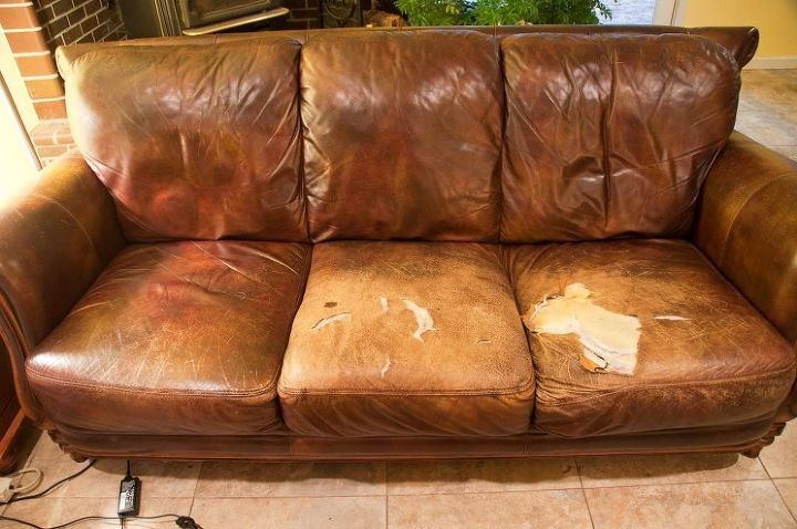 easy quick fix for a battered couch with upholstery fabric