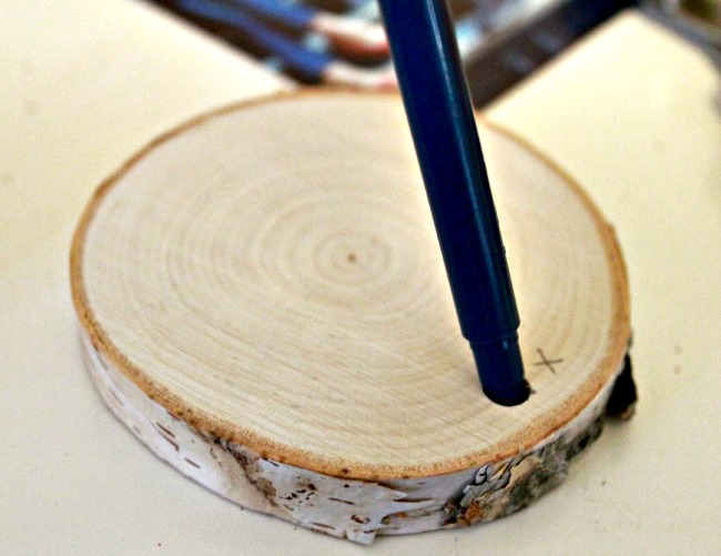 how to make birch coaster photo ornaments, christmas decorations, crafts, seasonal holiday decor, DRILL HOLE IN COASTER then mark on picture