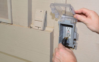 Instalar una nueva cubierta de la toma de corriente al aire libre para la seguridad eléctrica