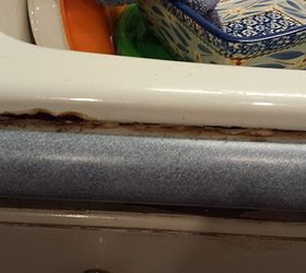replace kitchen sink caulk, This is in front it almost looks like it is rusted