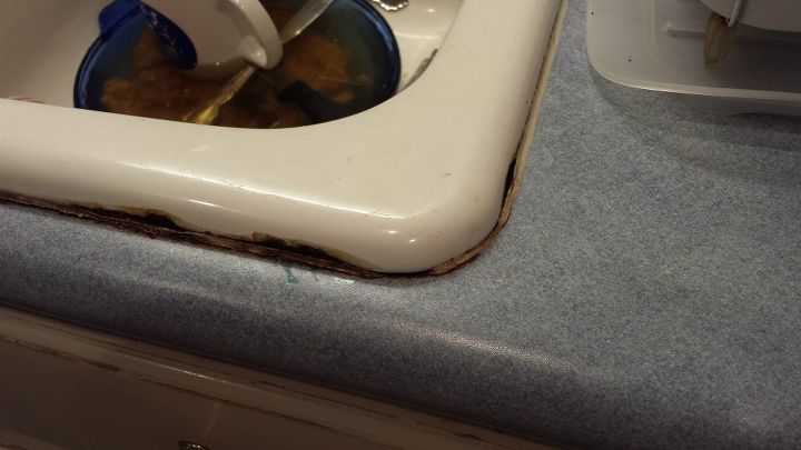 replace kitchen sink caulk, This is a corner pic