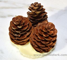 Melt tea lights in cupcake liners and then grab some pine cones for this cold-weather hack