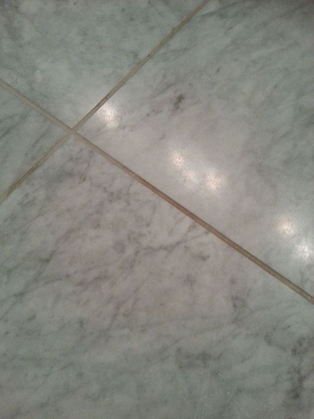 what do you use to clean grout on a honed marble floor
