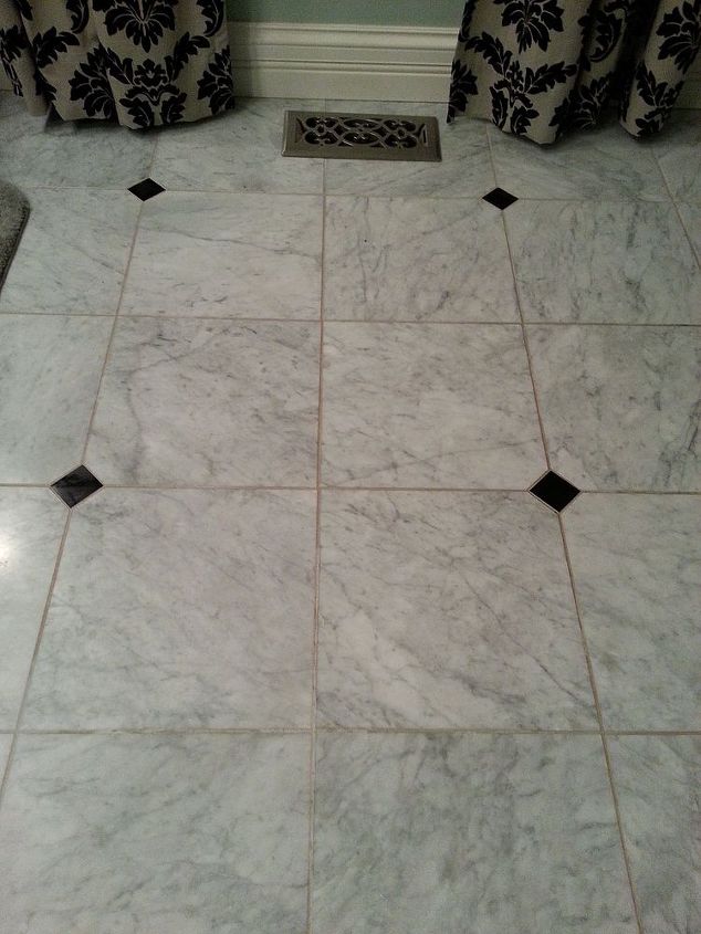 what do you use to clean grout on a honed marble floor