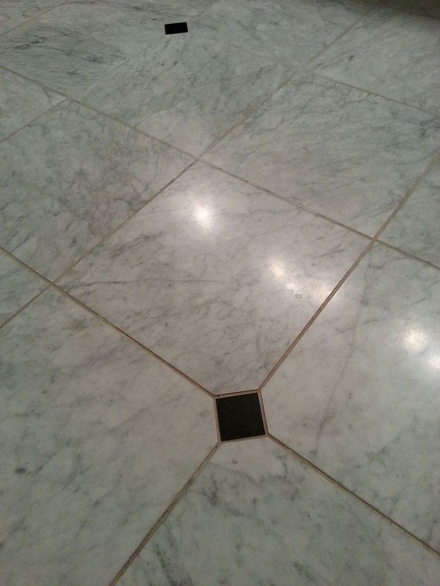 what do you use to clean grout on a honed marble floor